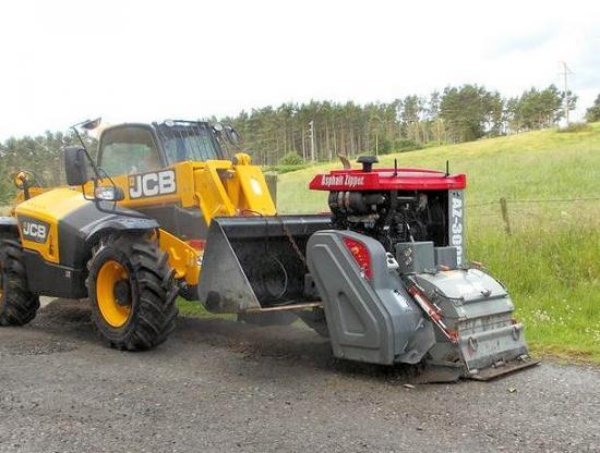 Photograph of Ground breaking road recycling trials get underway in Sutherland
